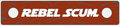 Brown rectangular sign with 'REBEL SCUM' text in white