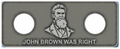 Metallic plaque with a portrait and 'John Brown Was Right' text on a gray background